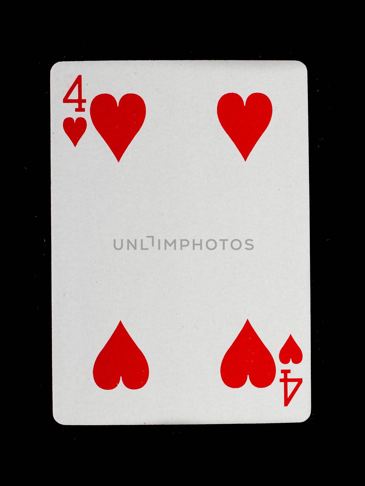 Playing card (four) isolated on a black background