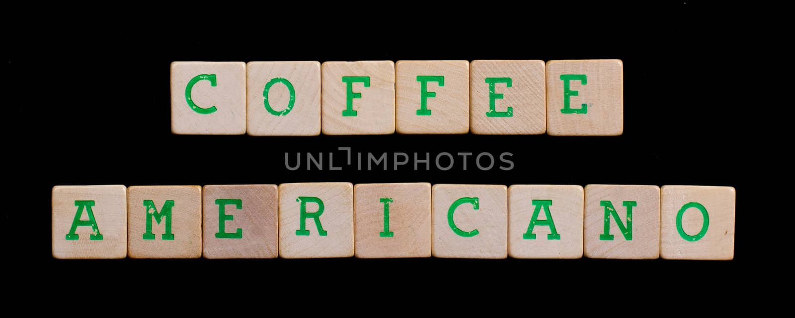 Green letters on old wooden blocks (coffee, americano)
