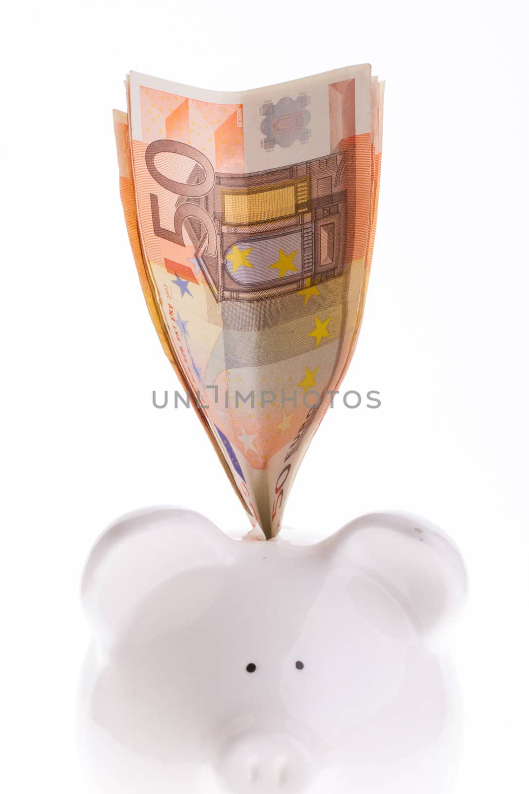Saving fifty euro in a white money box