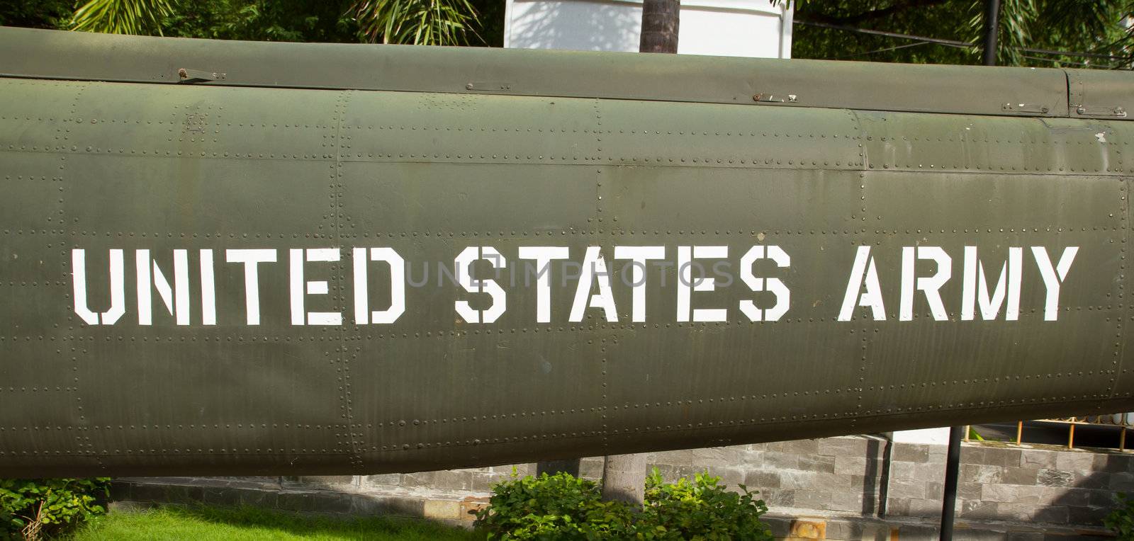 Text on an old Vietnam war Airplane displayed in Saigon by michaklootwijk