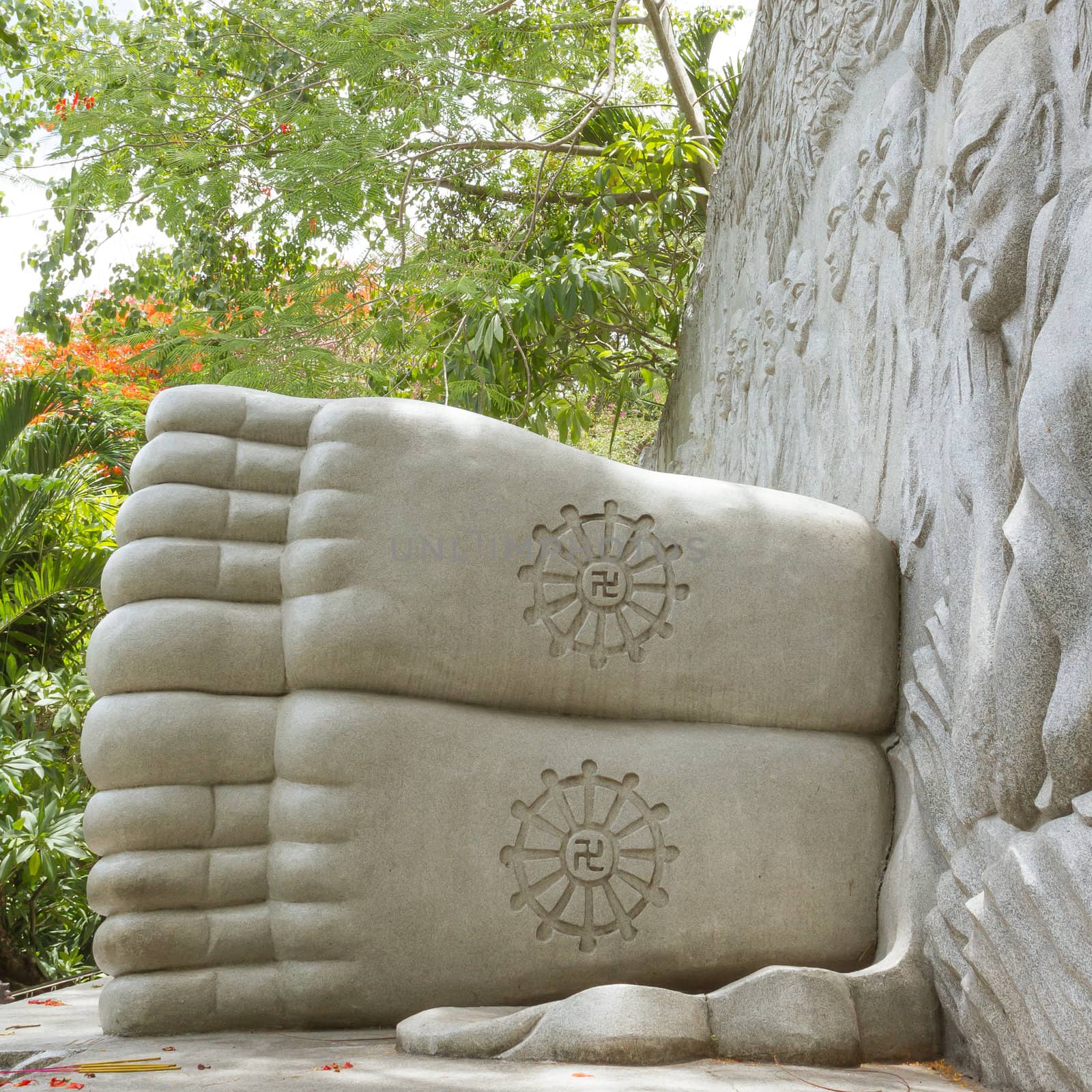 Feet of a sleeping buddha, decorated with a swastika, landmark on Nha Trang, Vietnam