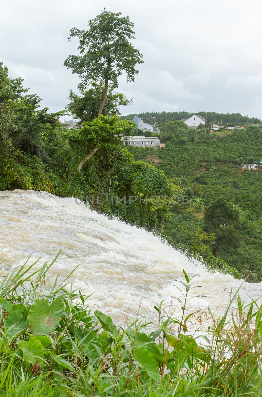 River ending in a waterfall in the south of Vietnam