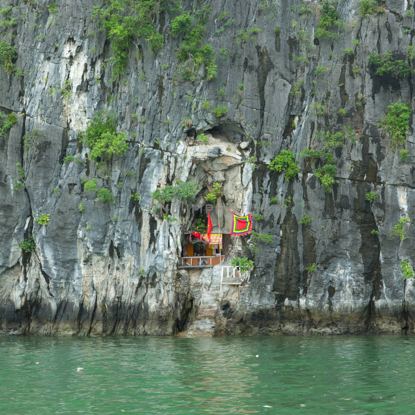 Altar in Vietnam, hidden in the mountain, Ha Long Bay by michaklootwijk