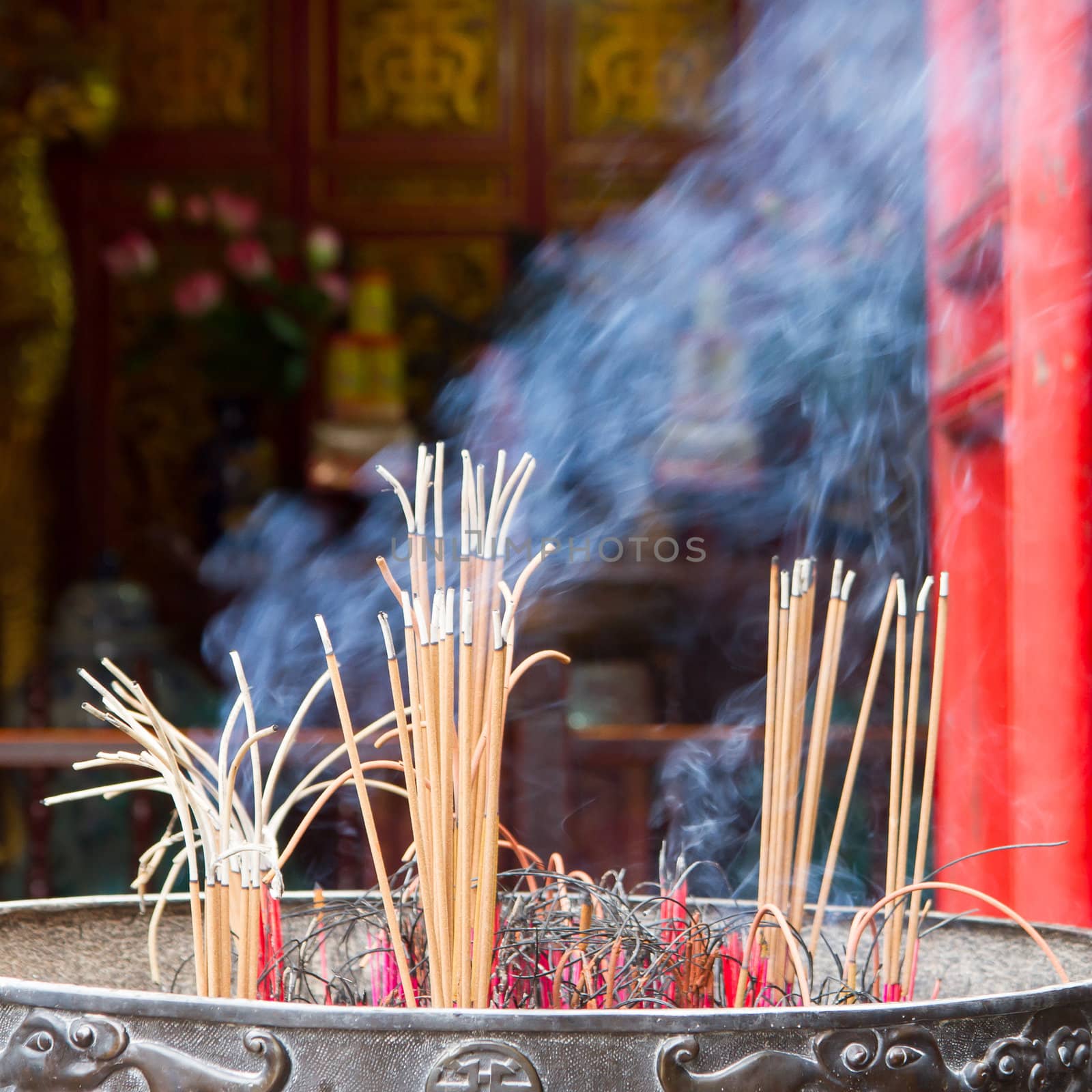 Incense furnace with smoking joss stick by michaklootwijk