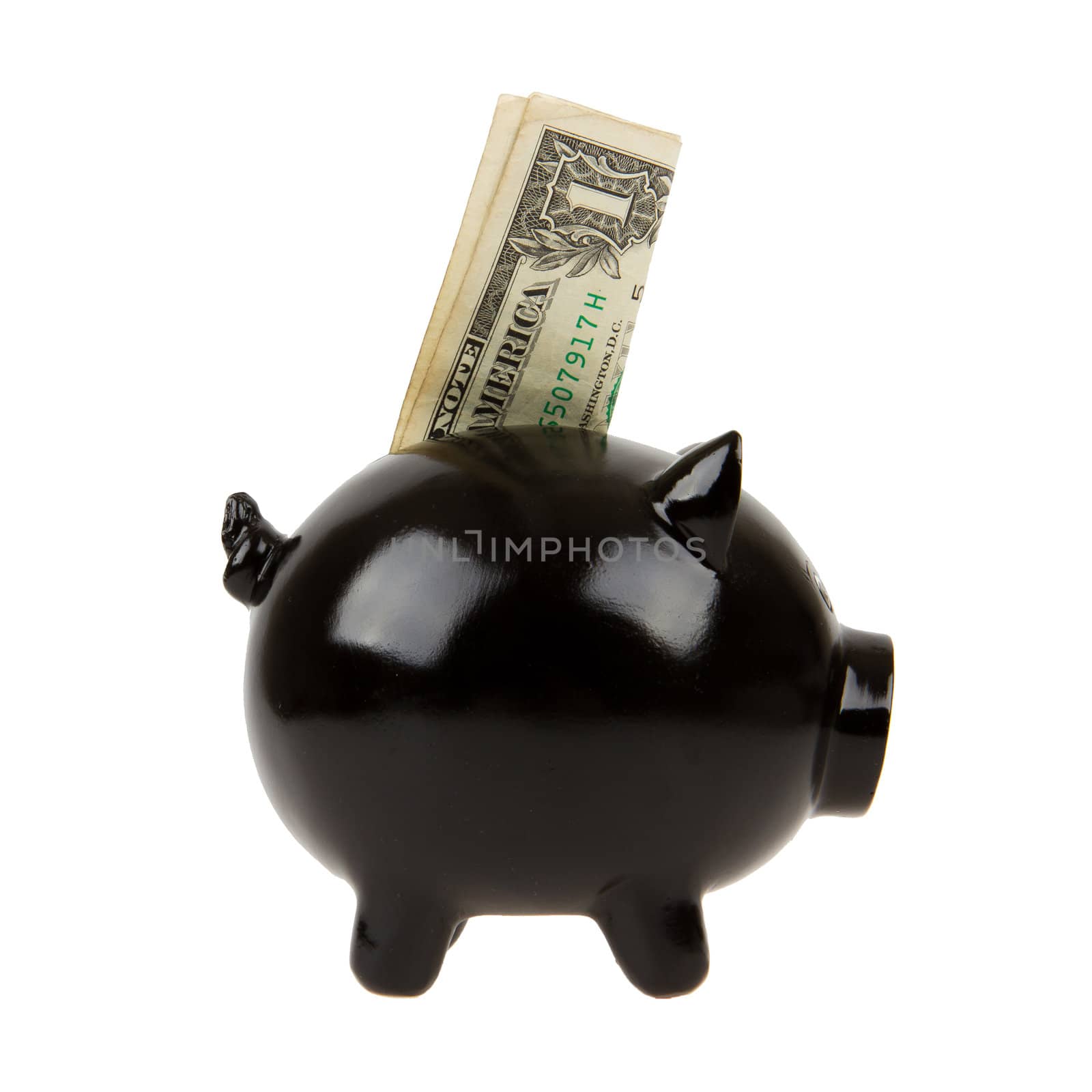 Black piggy bank with one dollar by michaklootwijk