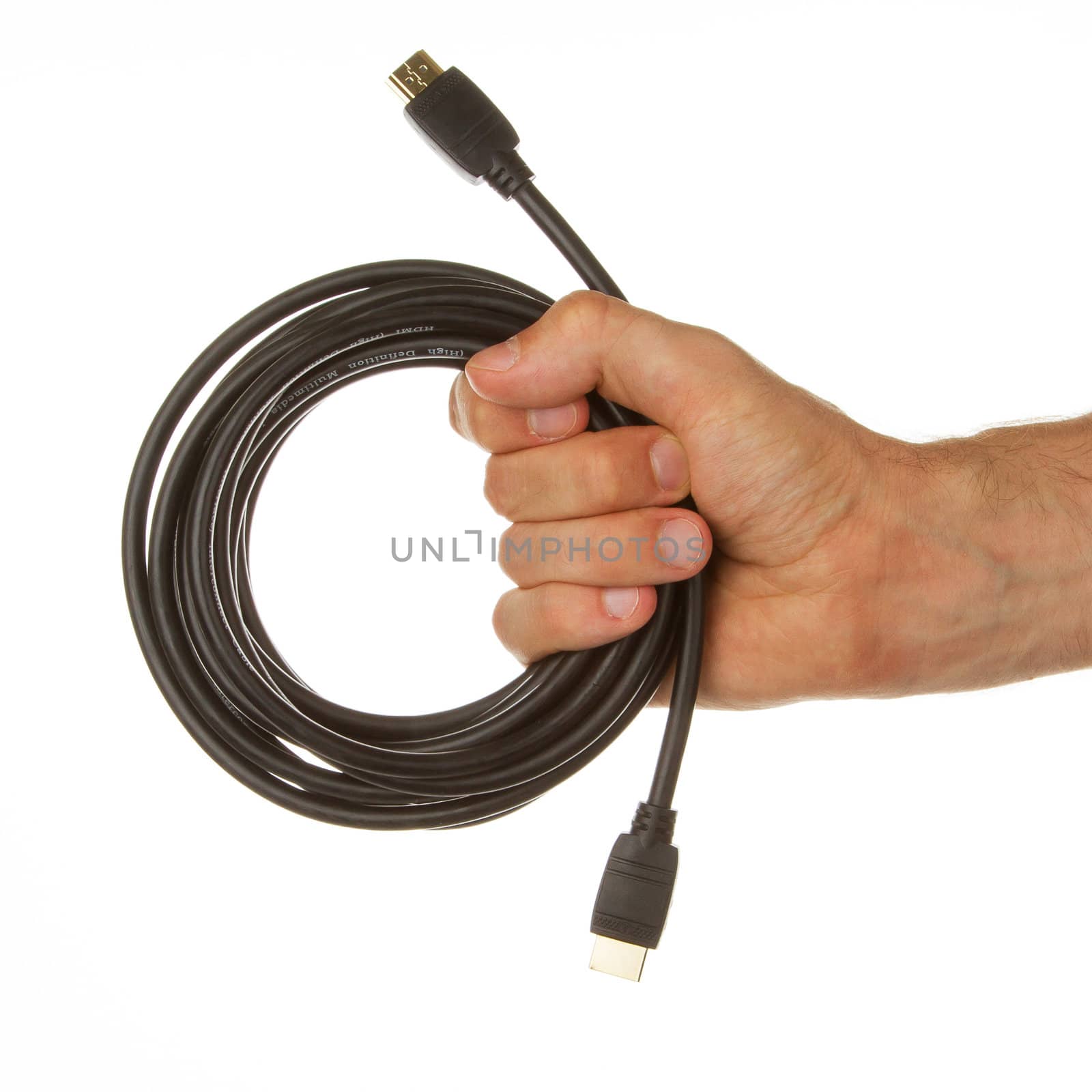 Close-up of hdmi cable in a hand on white background