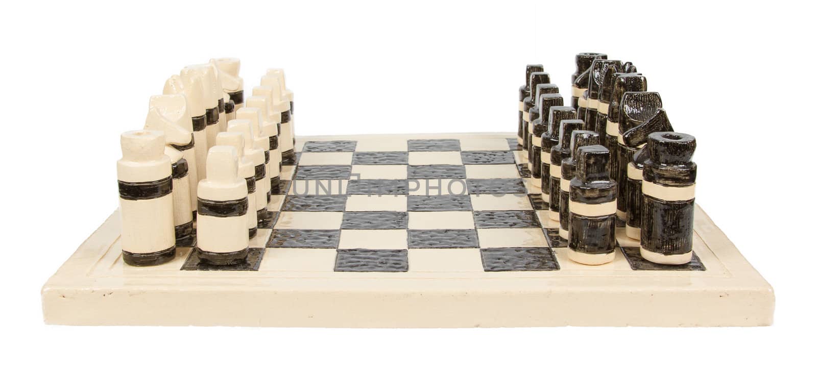 Unique handmade chess set (pottery), isolated, Holland