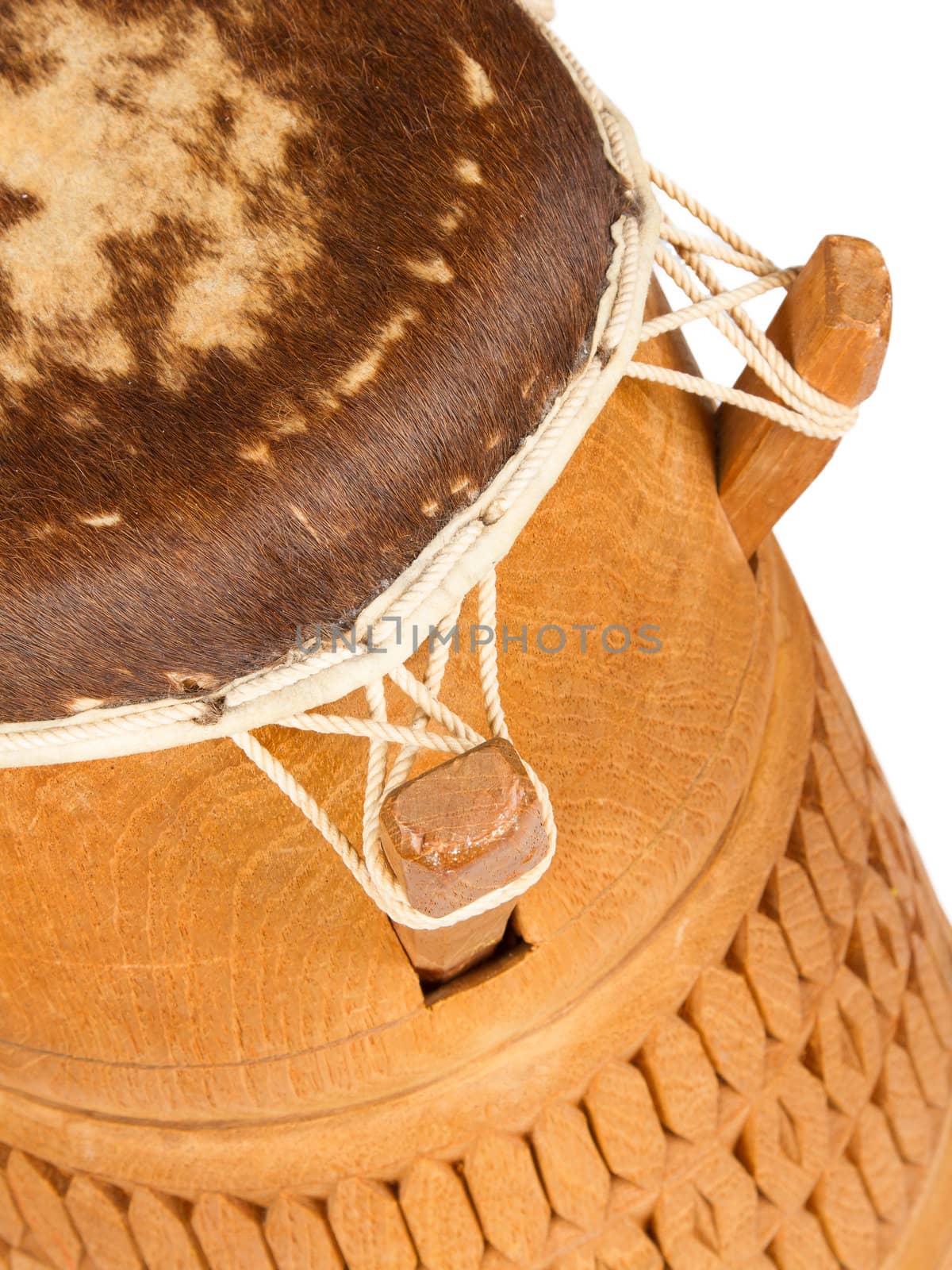 Djembe, Surinam percussion, handmade wooden drum with goat skin, ethnic musical instrument of carved wood and leather membrane, isolated