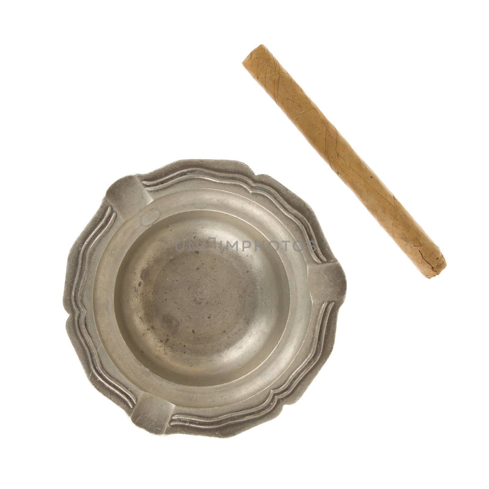 Unused large cigar with an old tin ashtray, isolated on white
