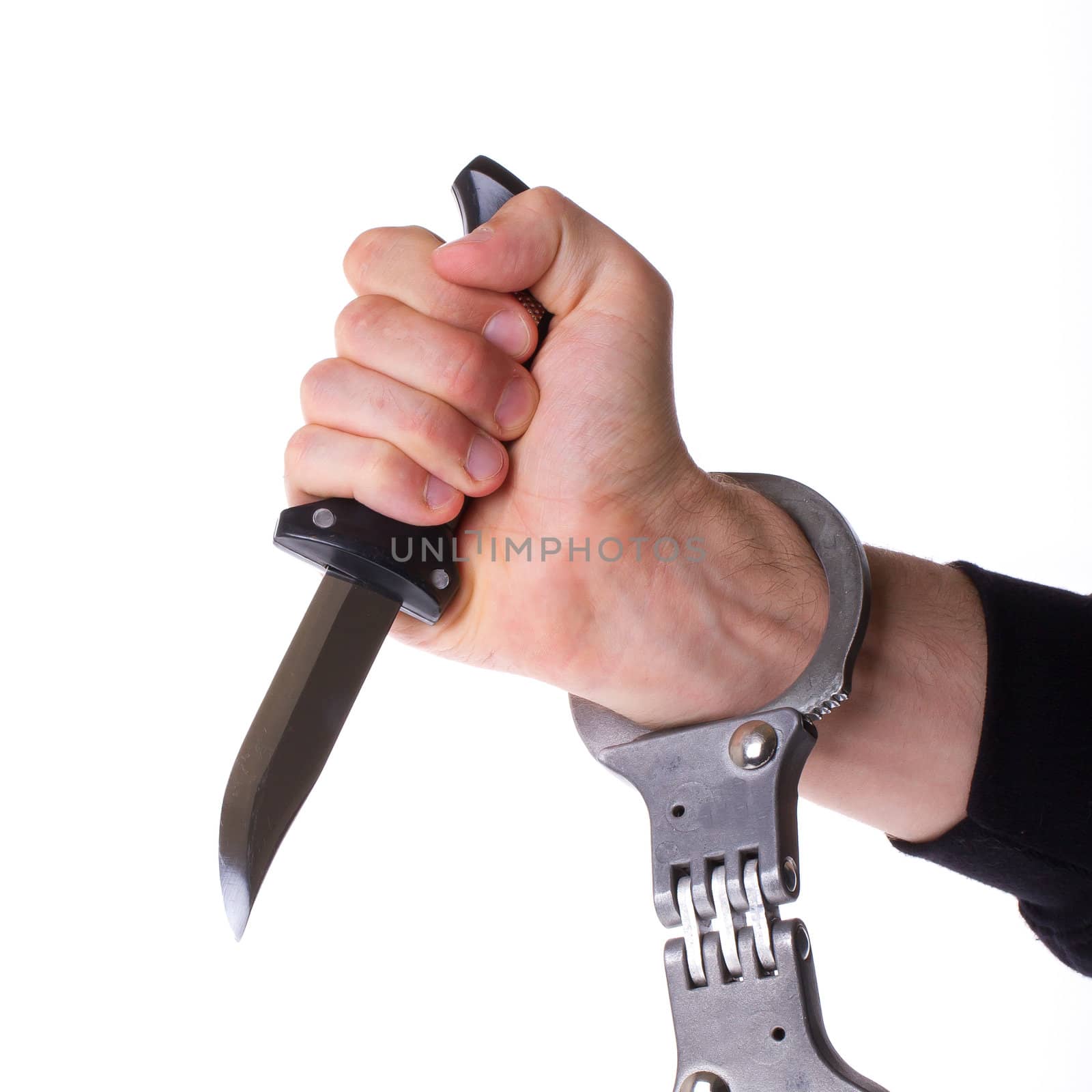 Male with a sharp knife in it's hand with a handcuff by michaklootwijk