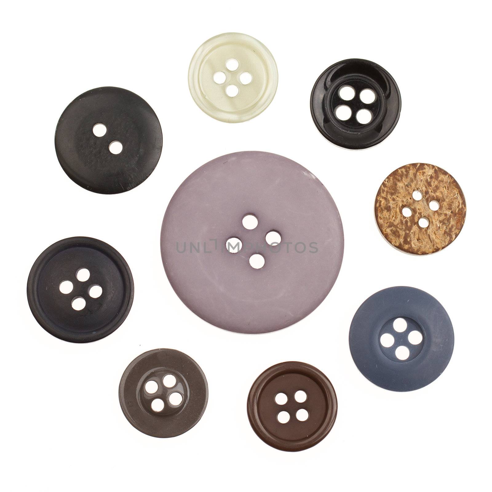 A collection of different buttons on a white background