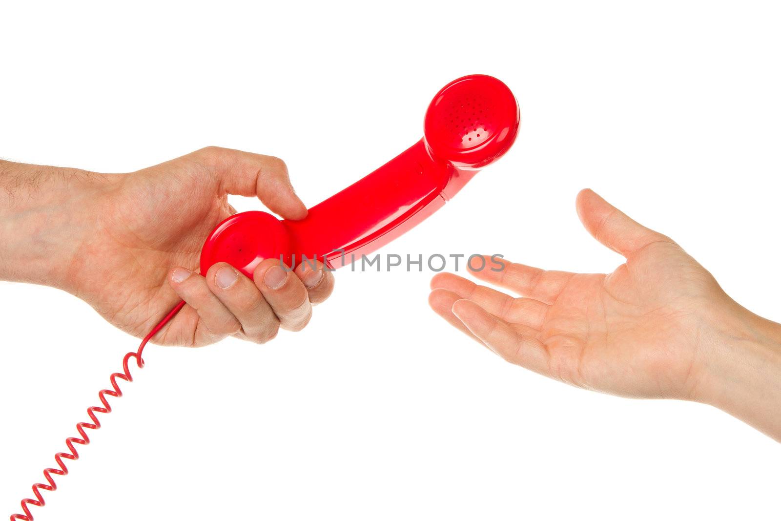 Man giving red telephone to woman by michaklootwijk