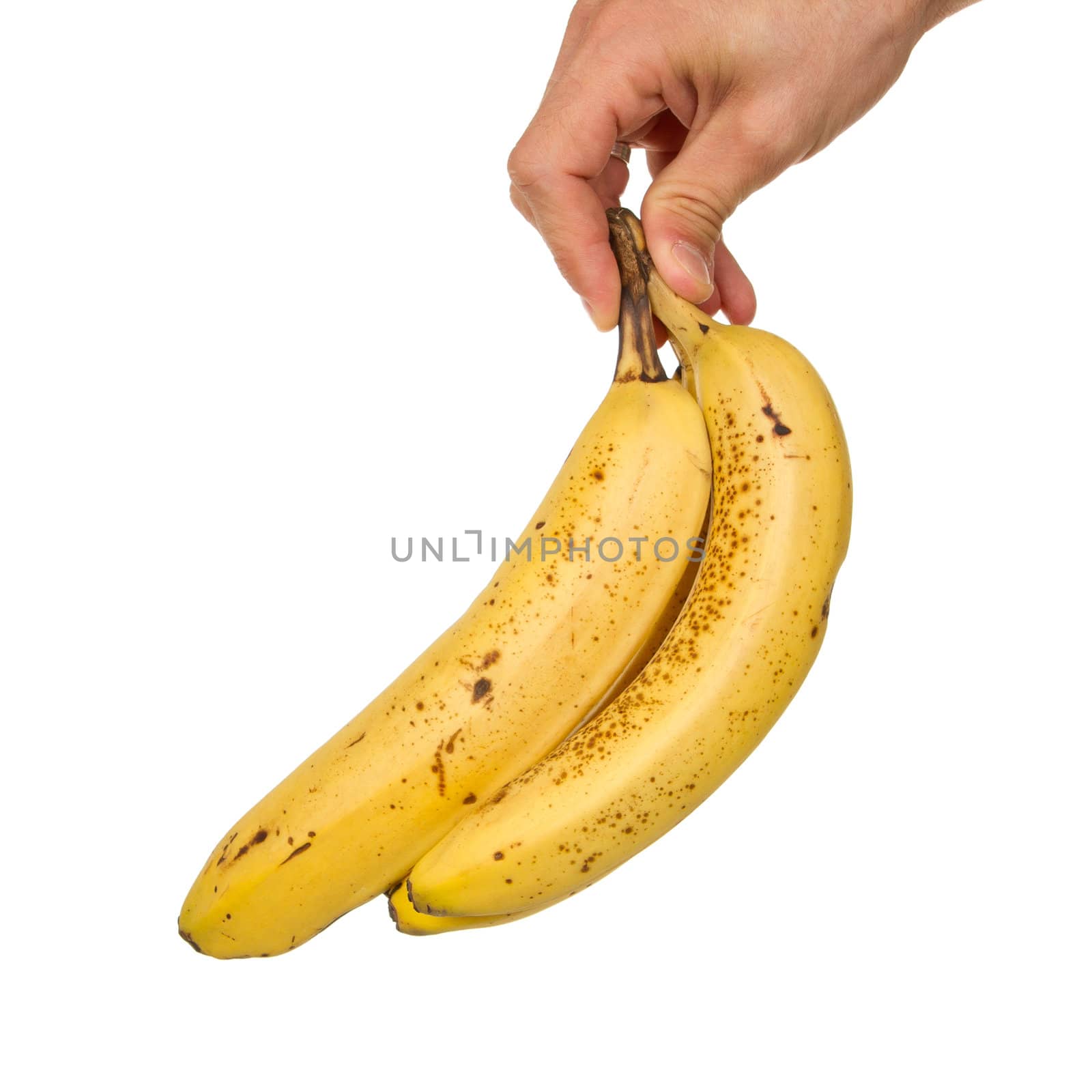 Hand full of bananas isolated on white