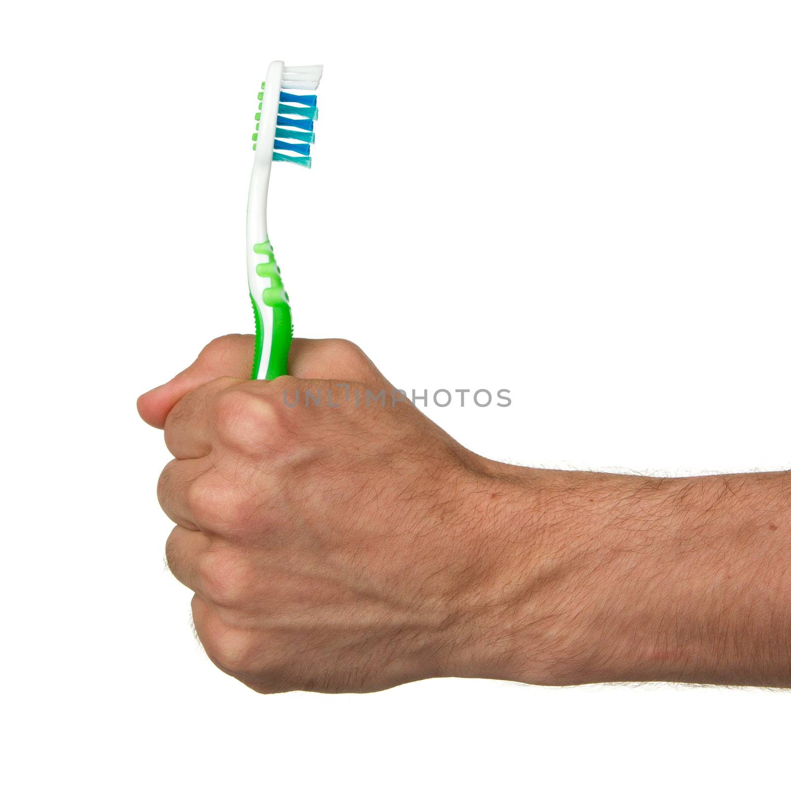 Man holding a green toothbrush, isolated on white