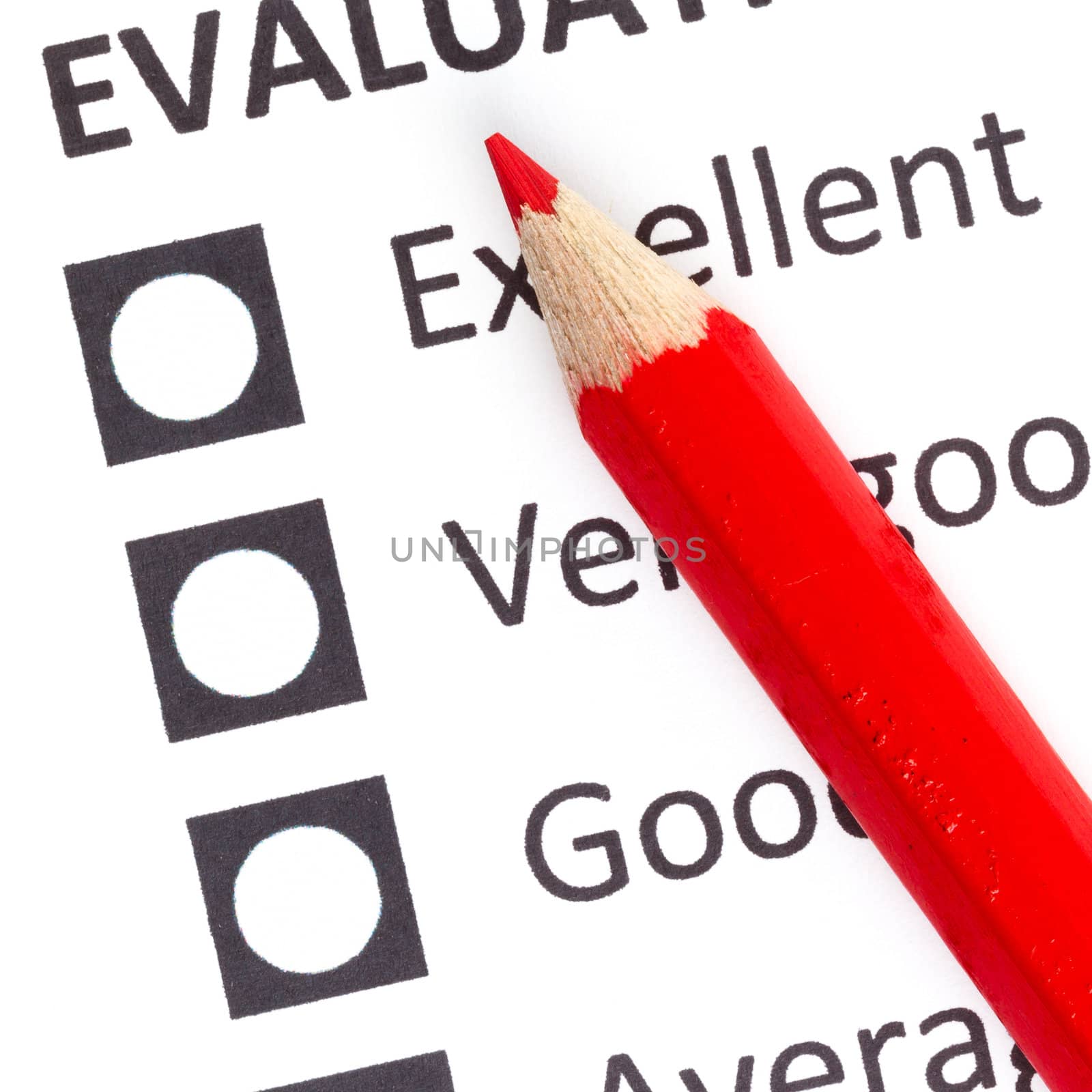 Red pencil on a evaluationform, choosing between excellent, very good and good