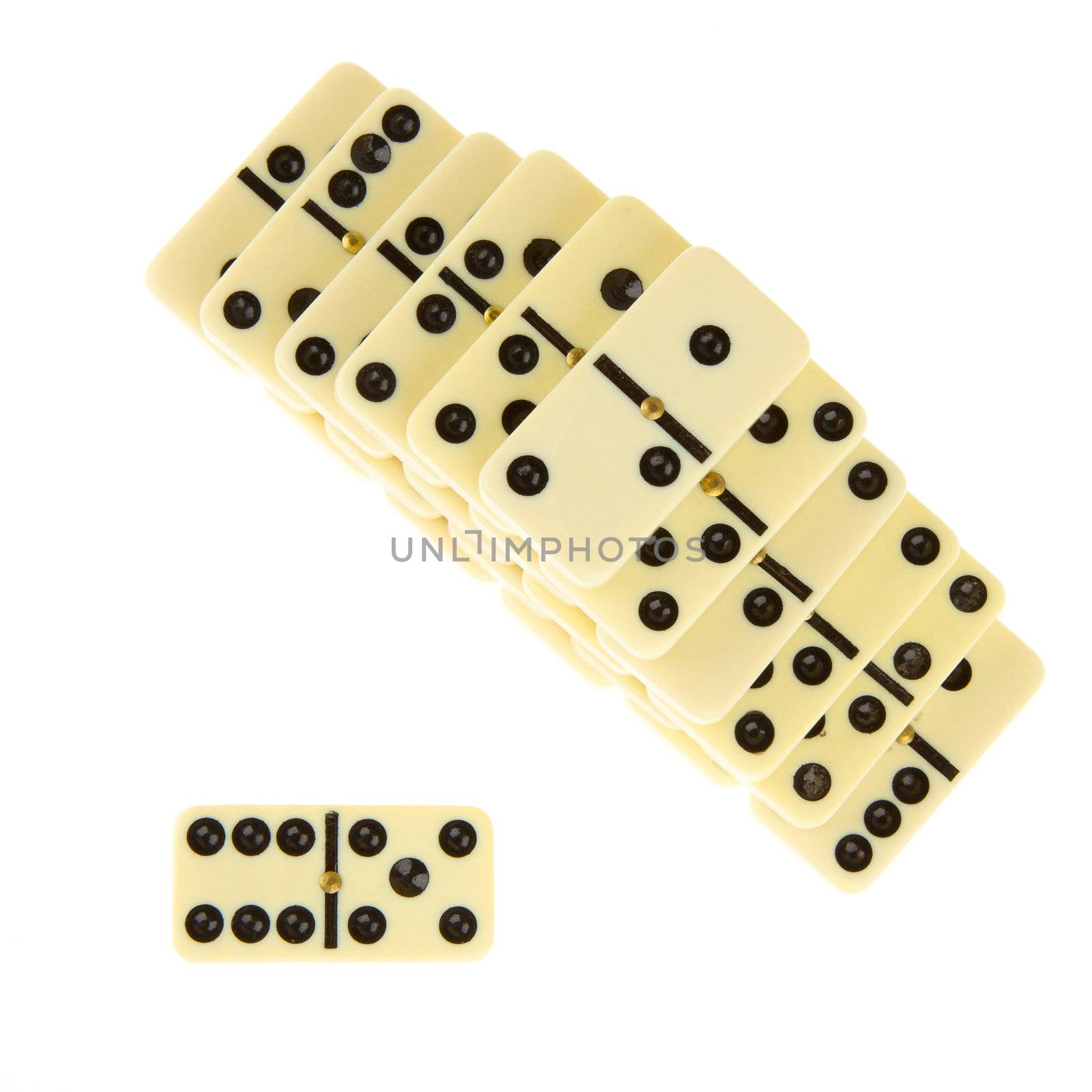 Stacks of dominoes on isolated white background