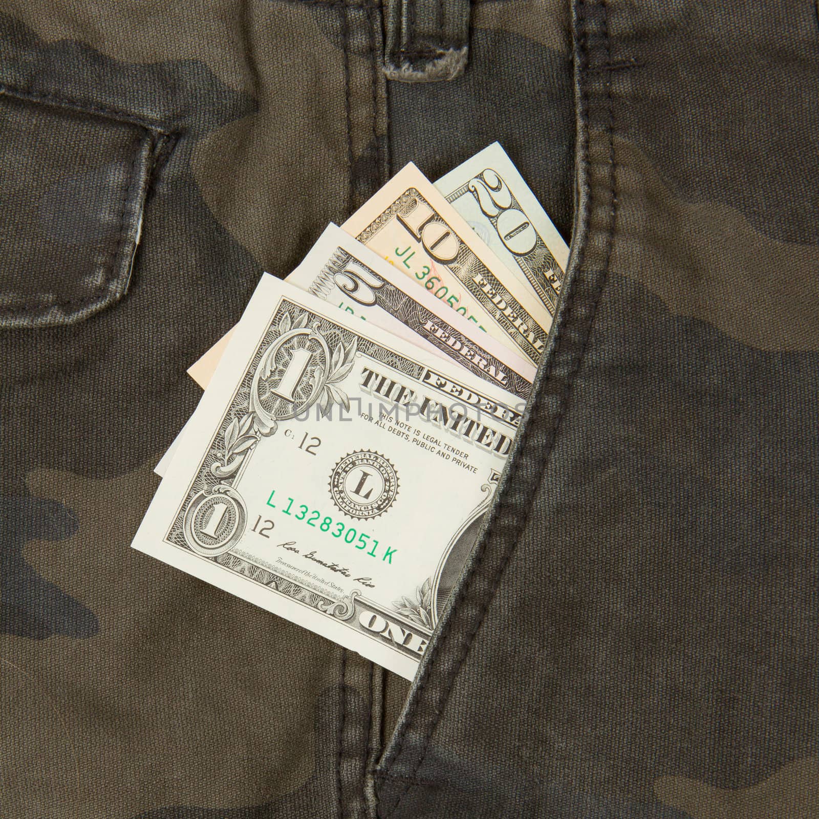 Macro shot of trendy jeans with american four different dollar b by michaklootwijk