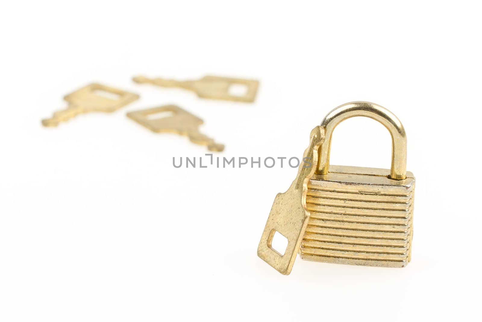 Closed padlock and keys isolated on white background