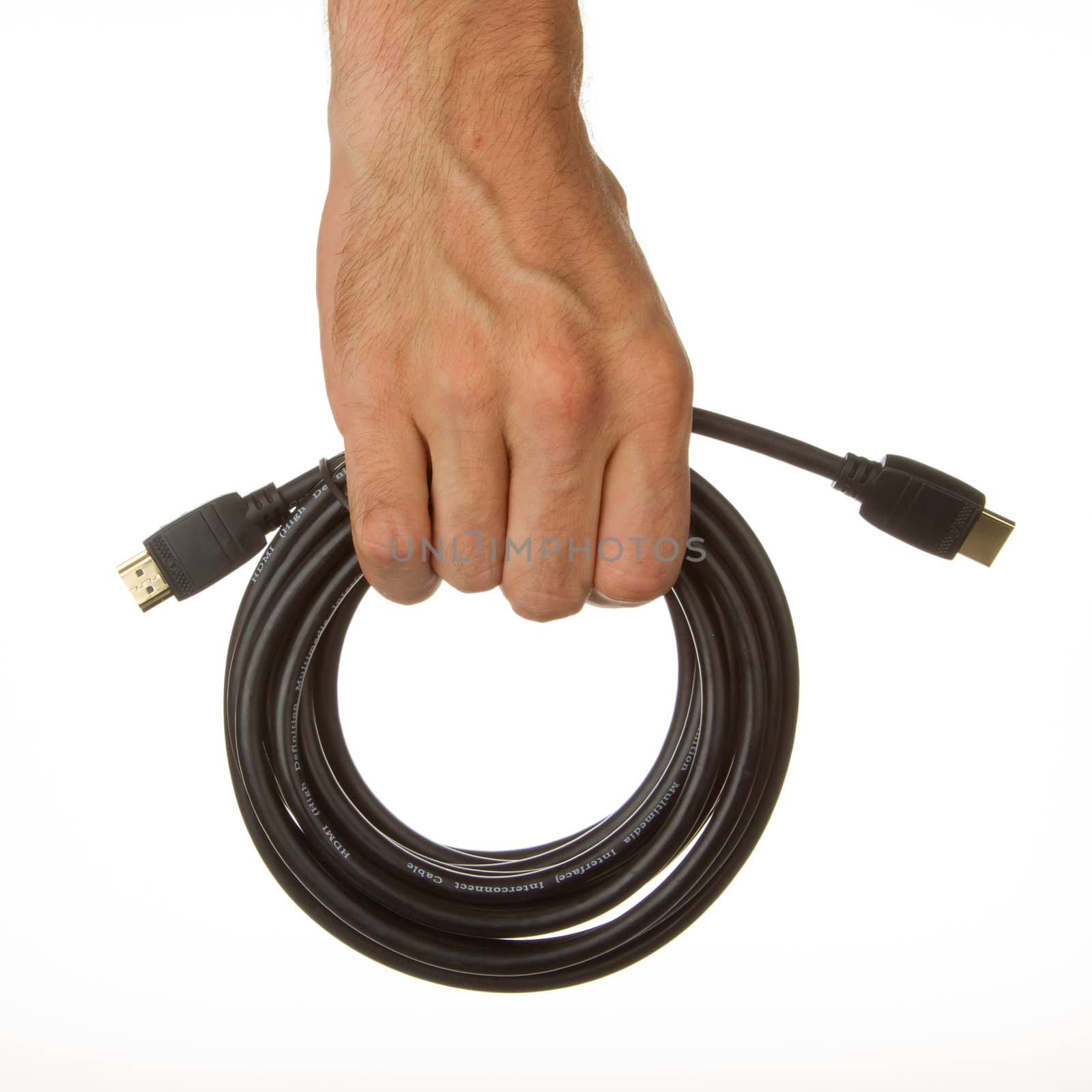 Close-up of hdmi cable in a hand on white background