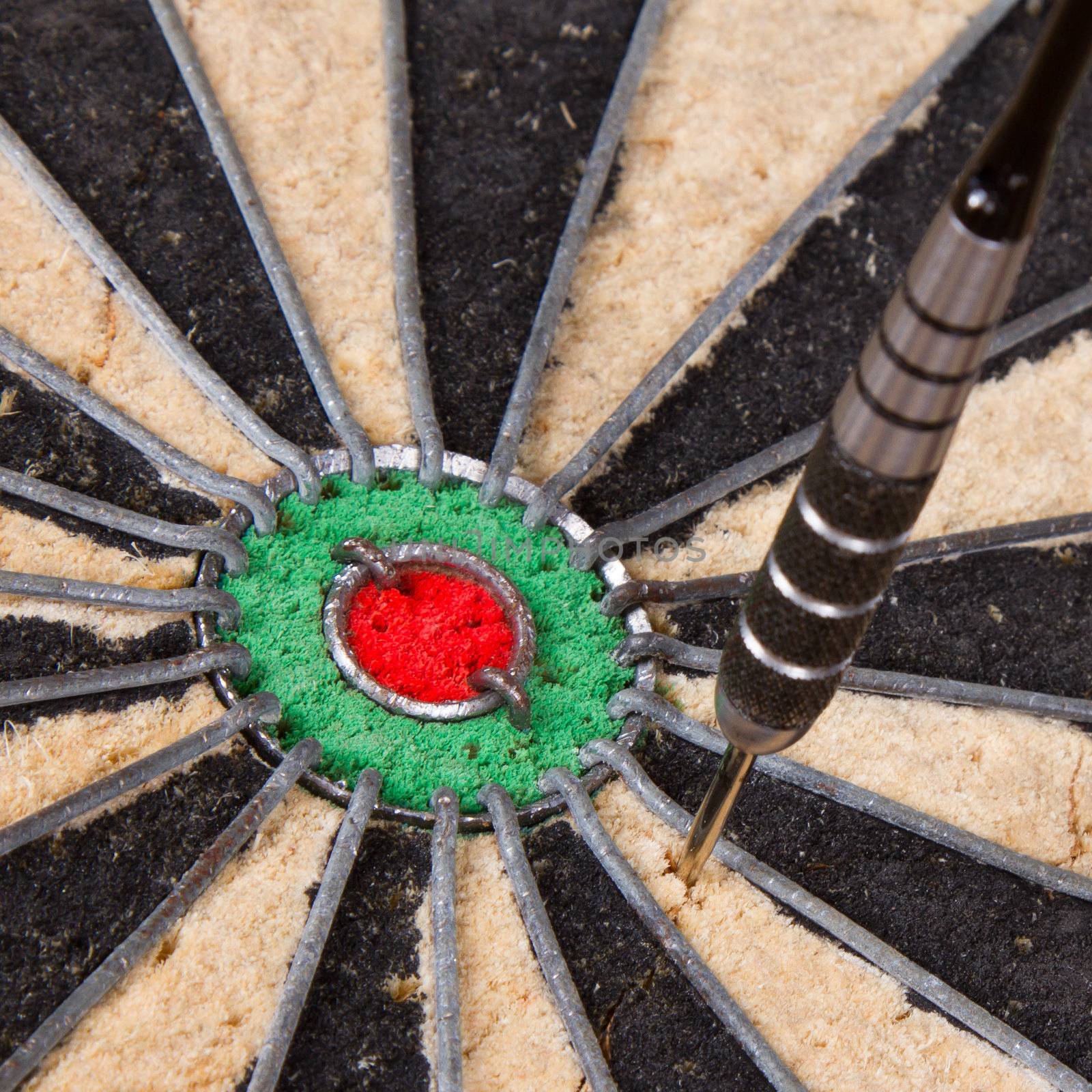 Close-up of a very old dartboard, isolated