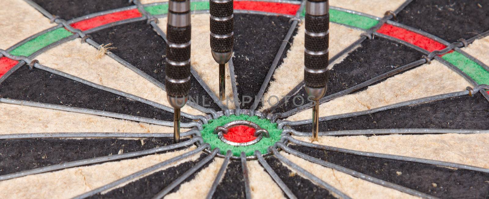 Close-up of a very old dartboard, isolated