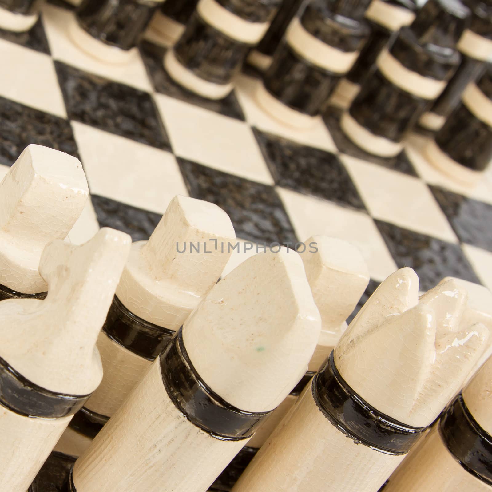 Unique handmade chess set (pottery), isolated, Holland