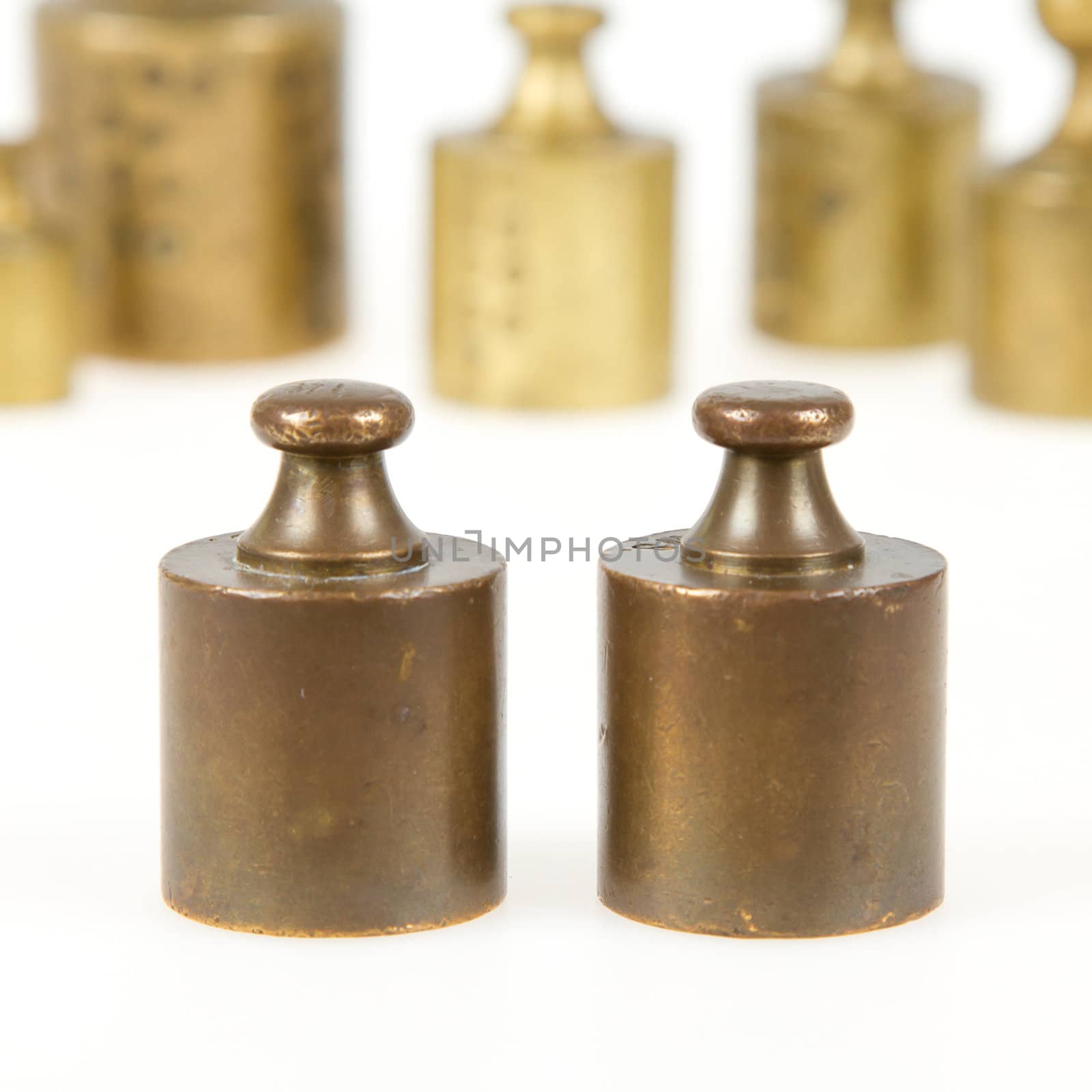 Old brass antique weights, Holland, isolated on white