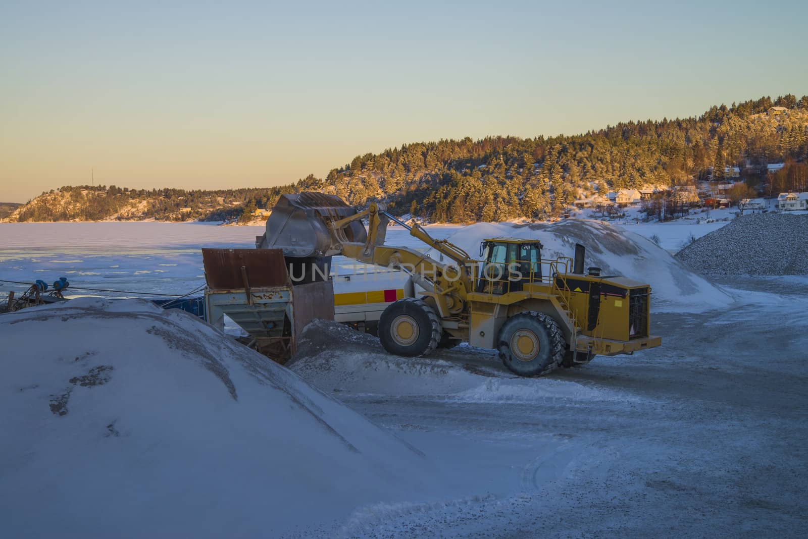 Bakke is a village in Halden and here is located "Brekke" quarry. The quarry is about a kilometer away from "Bakke" shipping harbor where all the gravel, crushed stone and sand are stored and will be shipped out.