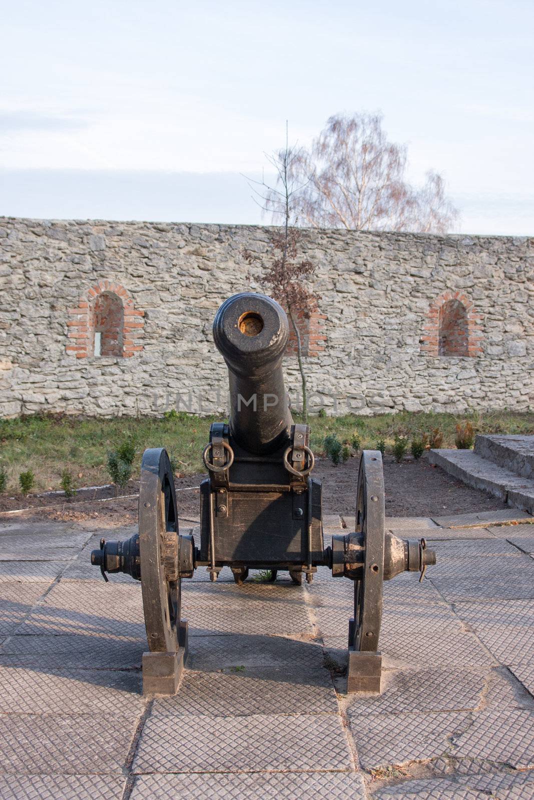 Ancient cannon on wheels. Dubno Castle. Ukraine
