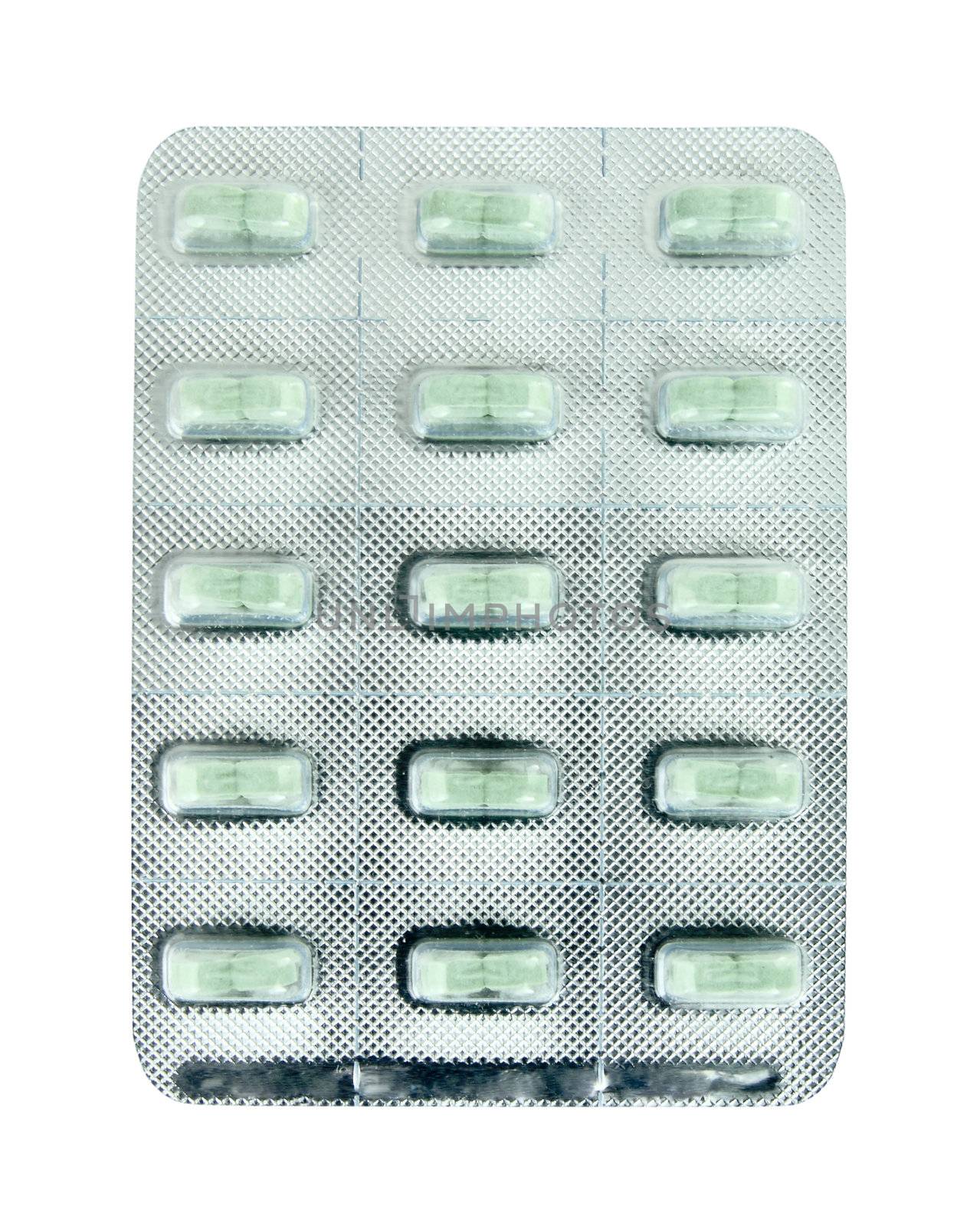 pack of green pills on white background