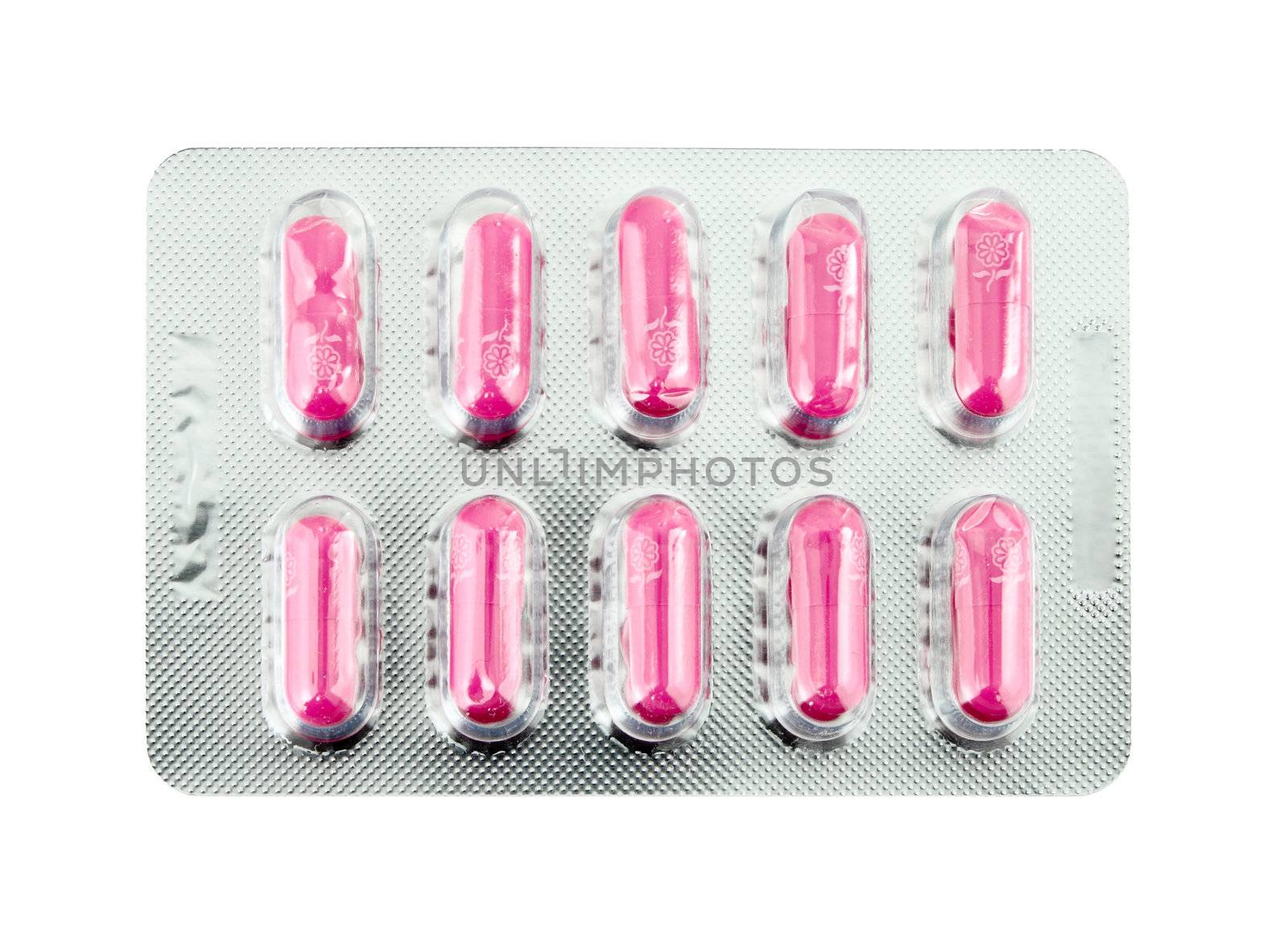 Pink pills pack on white by geargodz