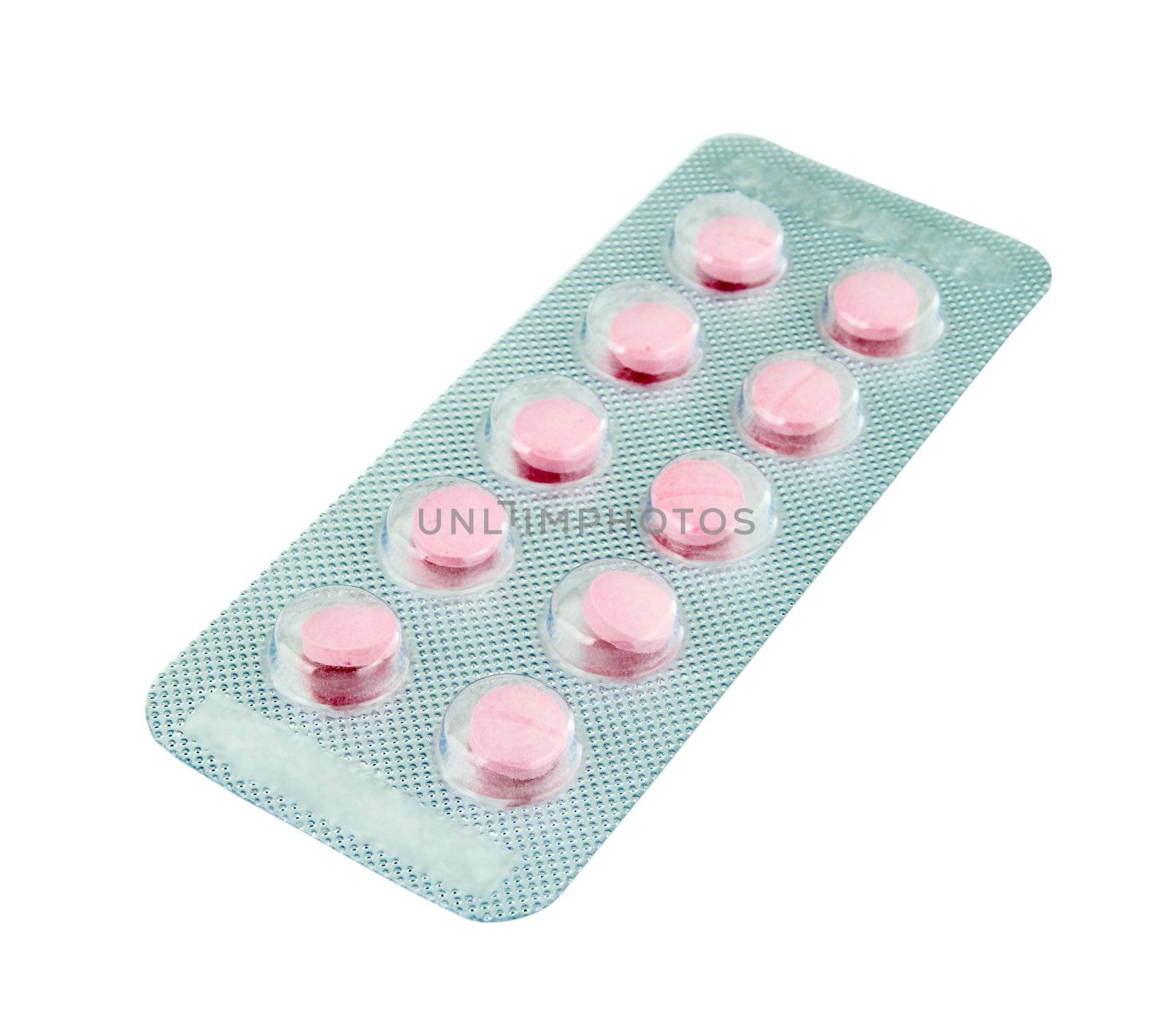 pack of pink pills on white background