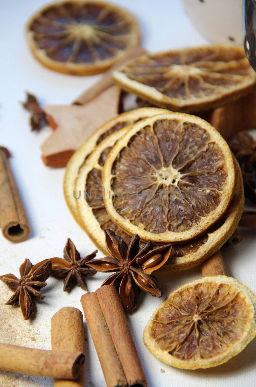 Cinnamon sticks and dry orange by tanouchka