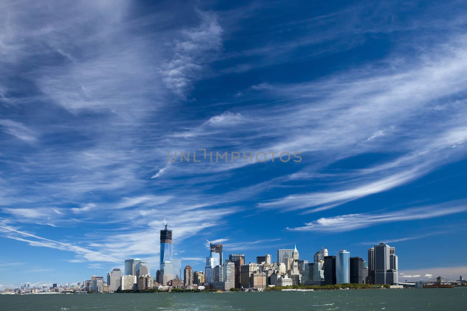 The New York City skyline at afternoon w the Tower 4 and Freedom tower under construction