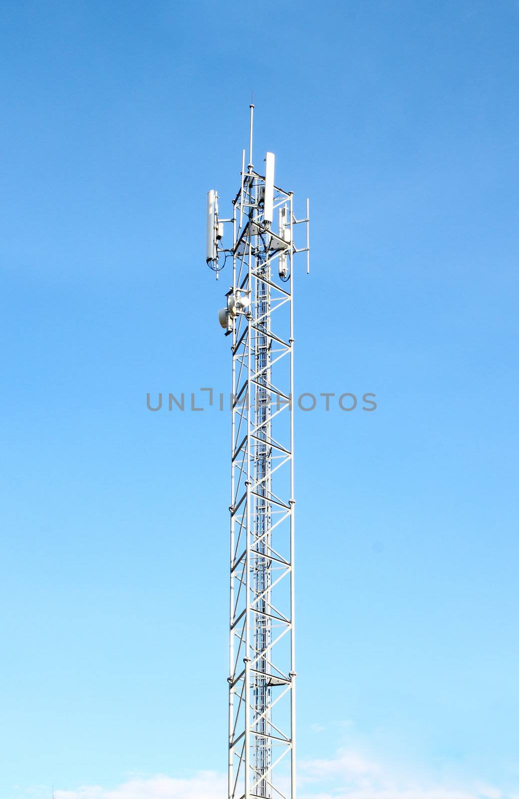 mobile telecommunication tower with blue sky background