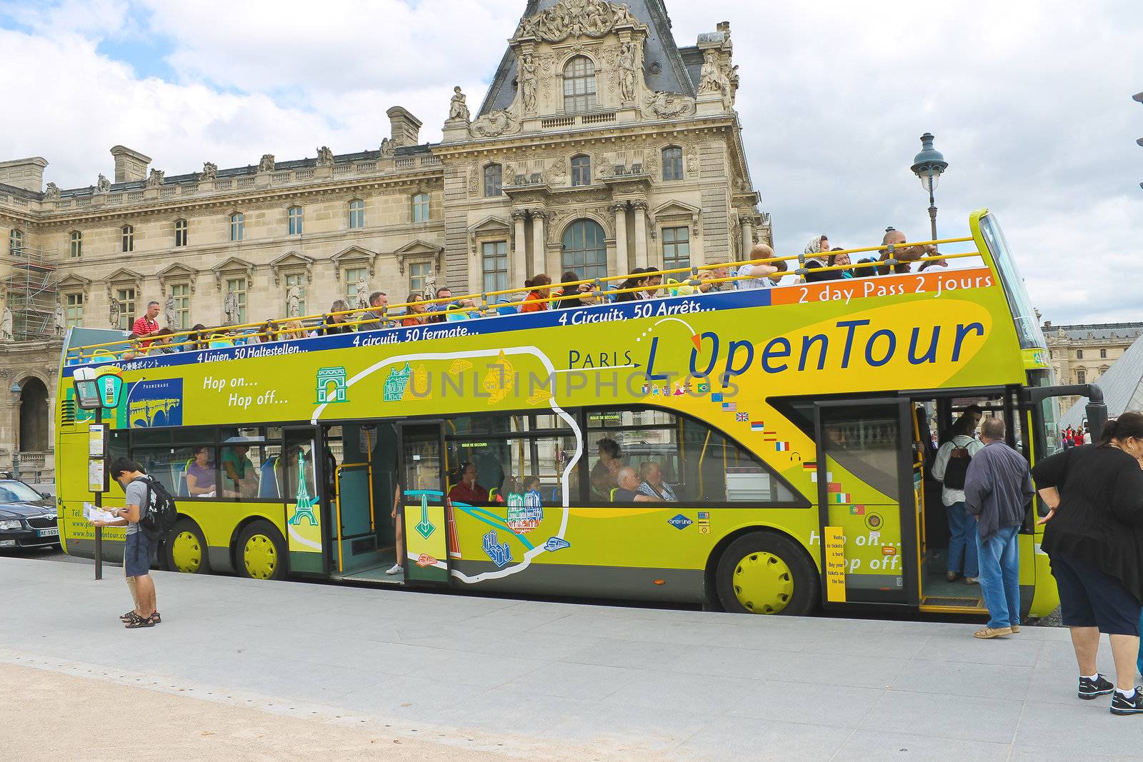 Tourists bus in heart of Paris. France by NickNick