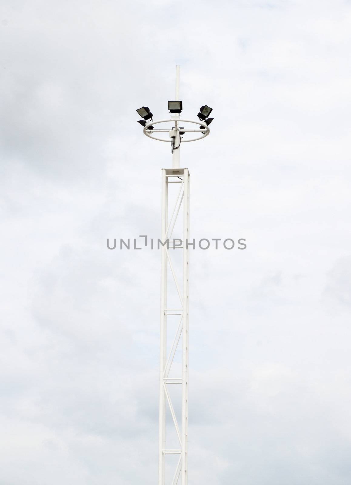 Spot light pole with the sky