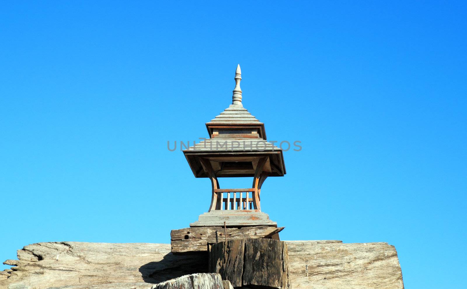 wood ancient lamp with the blue sky