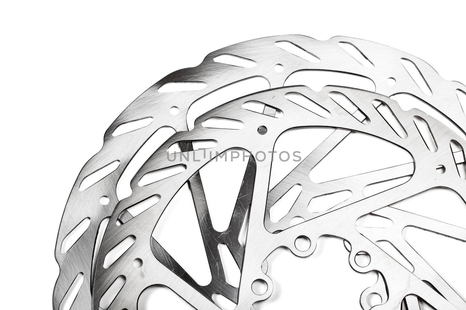 Mountain bike disk rotors on white background