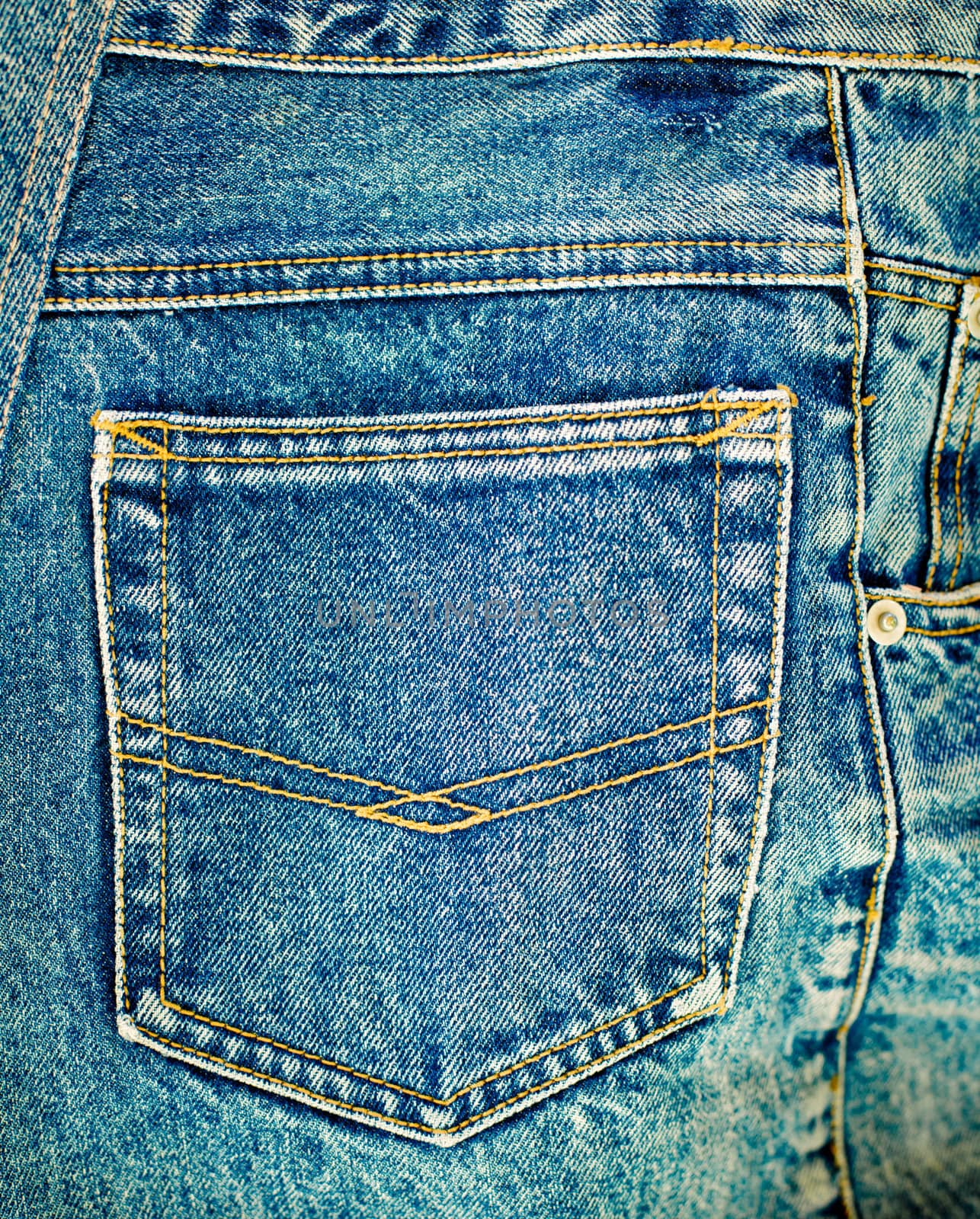 Blue jeans detail with empty pocket