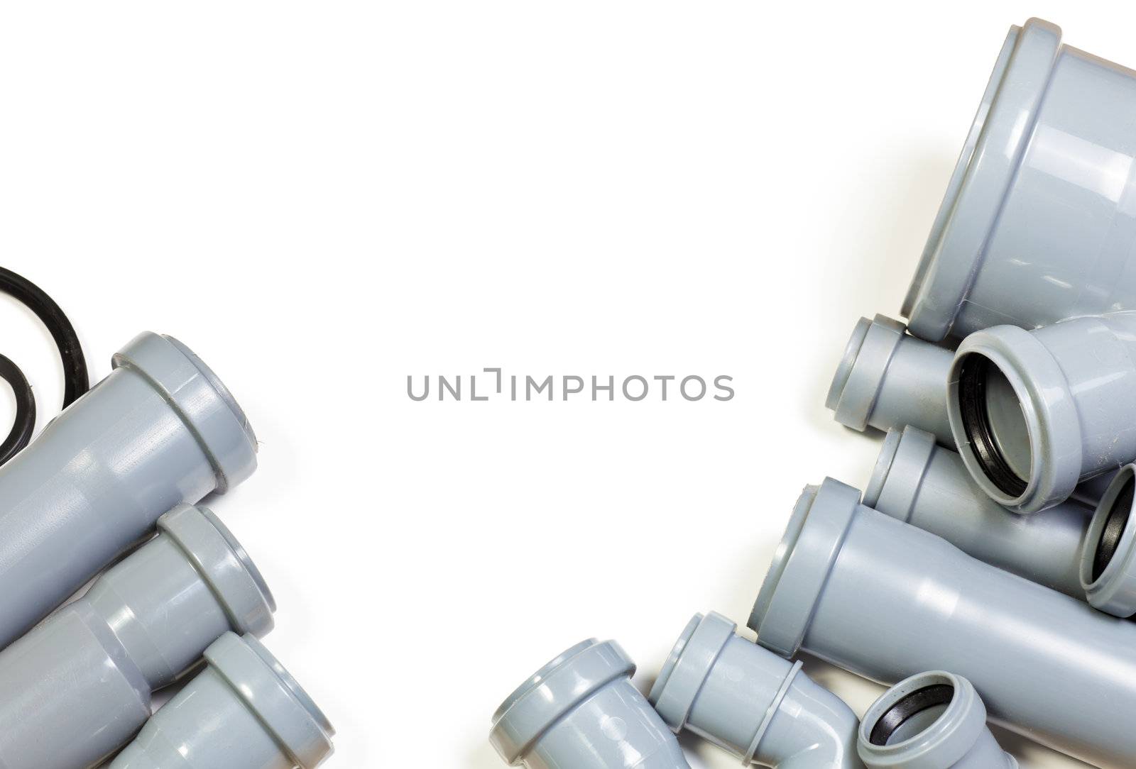 Grey PVC sewer pipes on white background