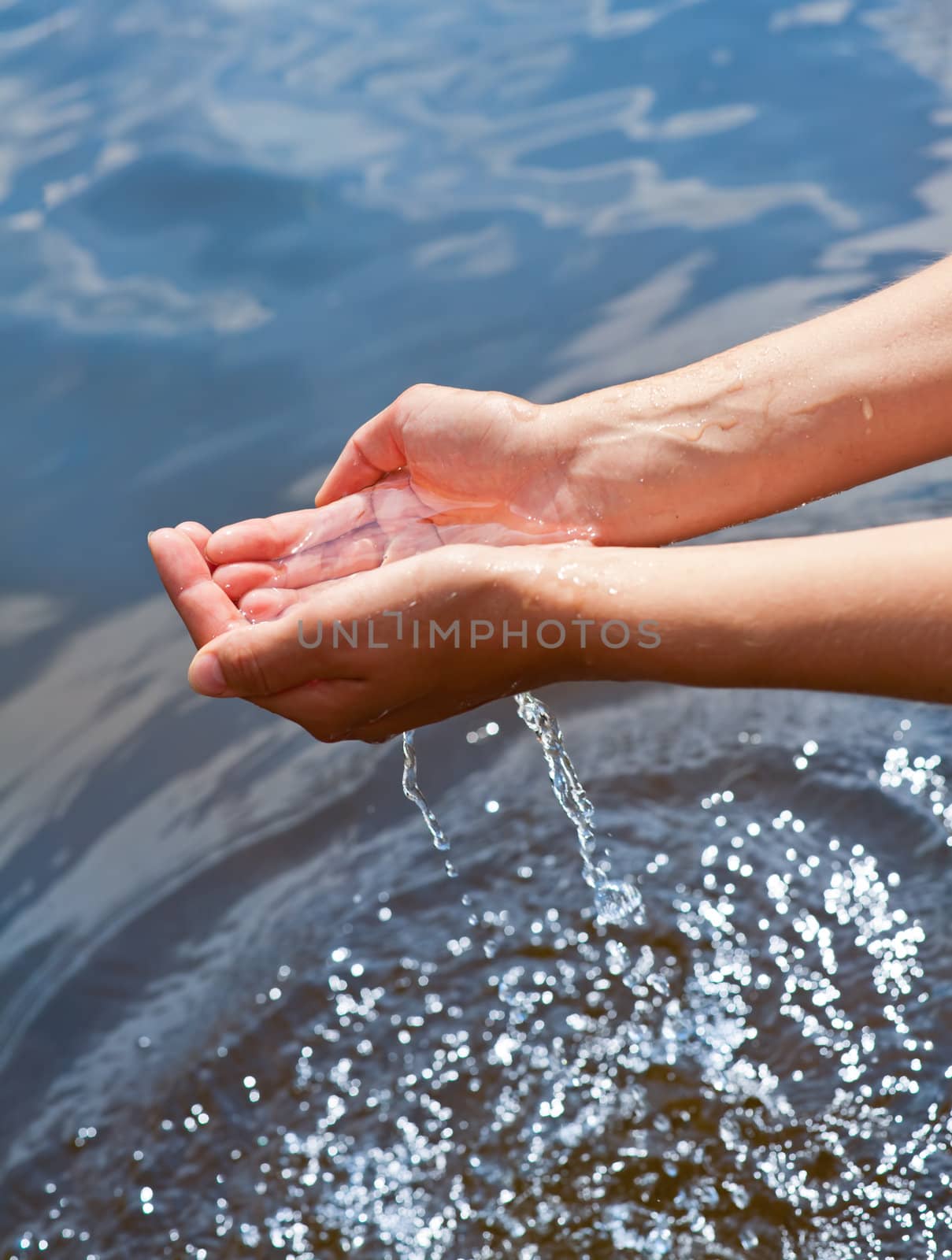 Water in hands by naumoid