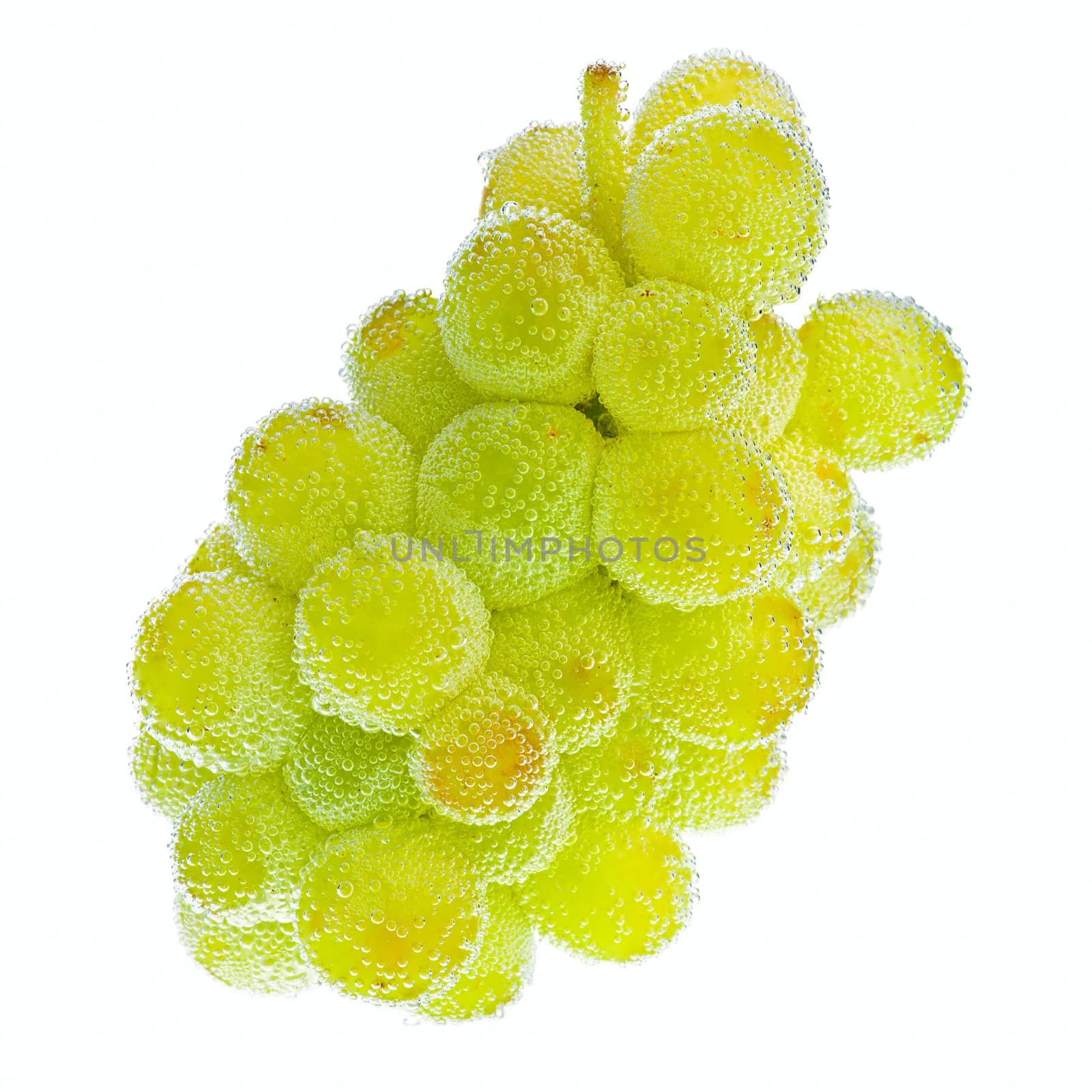 Grapes in water with bubbles on white background