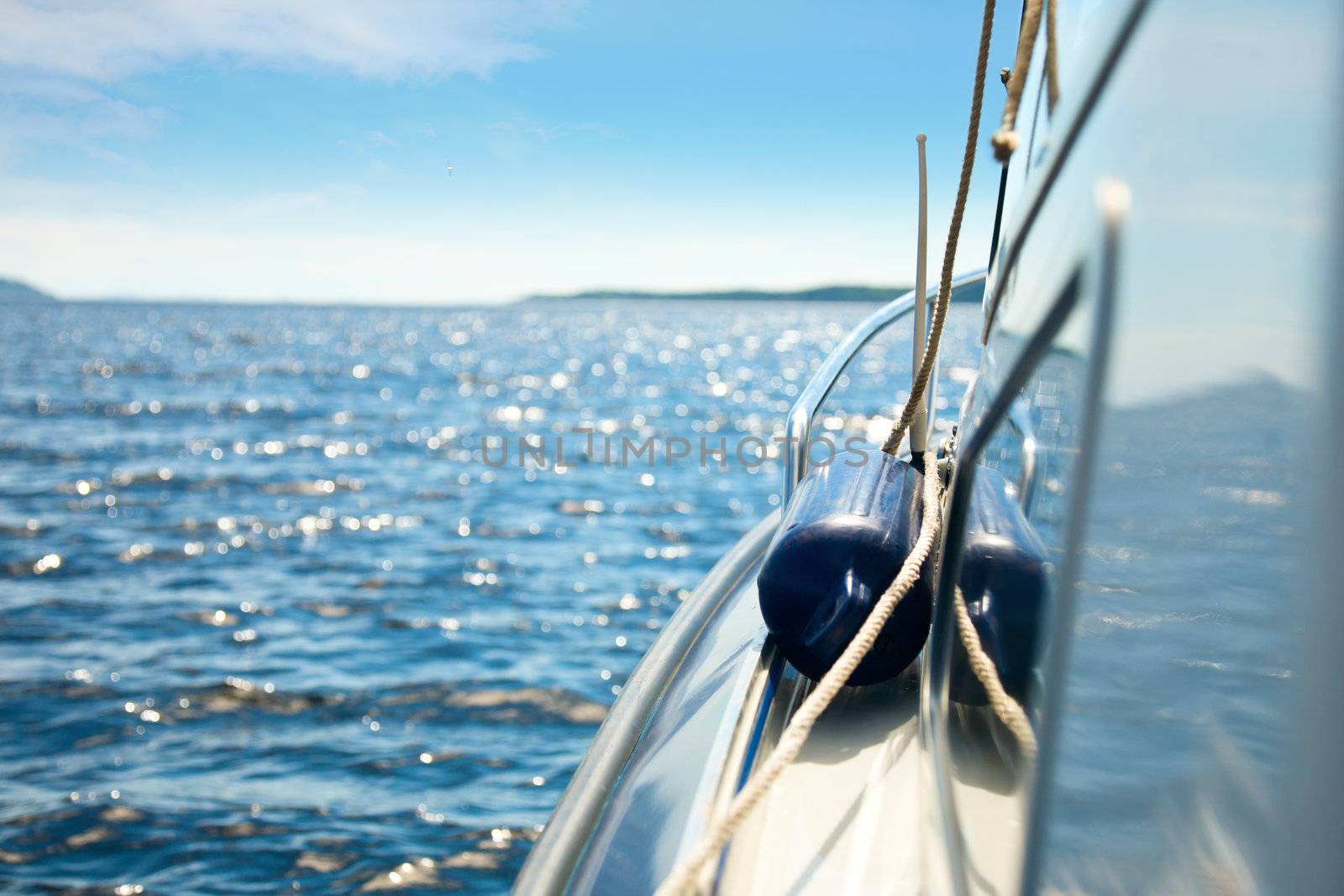 Detail of motor boat cruising in the sea