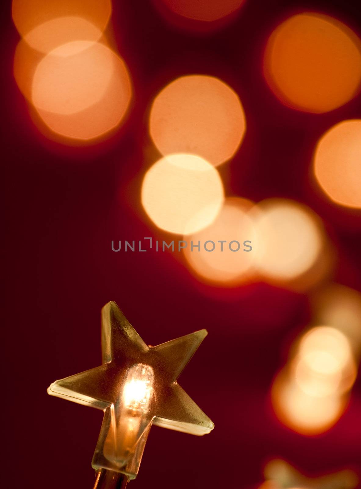 Star shaped Christmas light with blurred background, shallow DOF