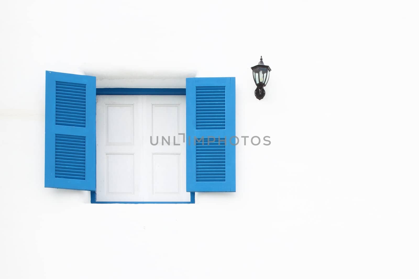 Greek Style windows and lamp on white wall