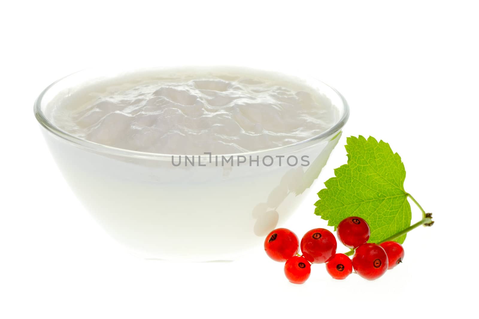 Yogurt bowl with Redcurrant berries on white background