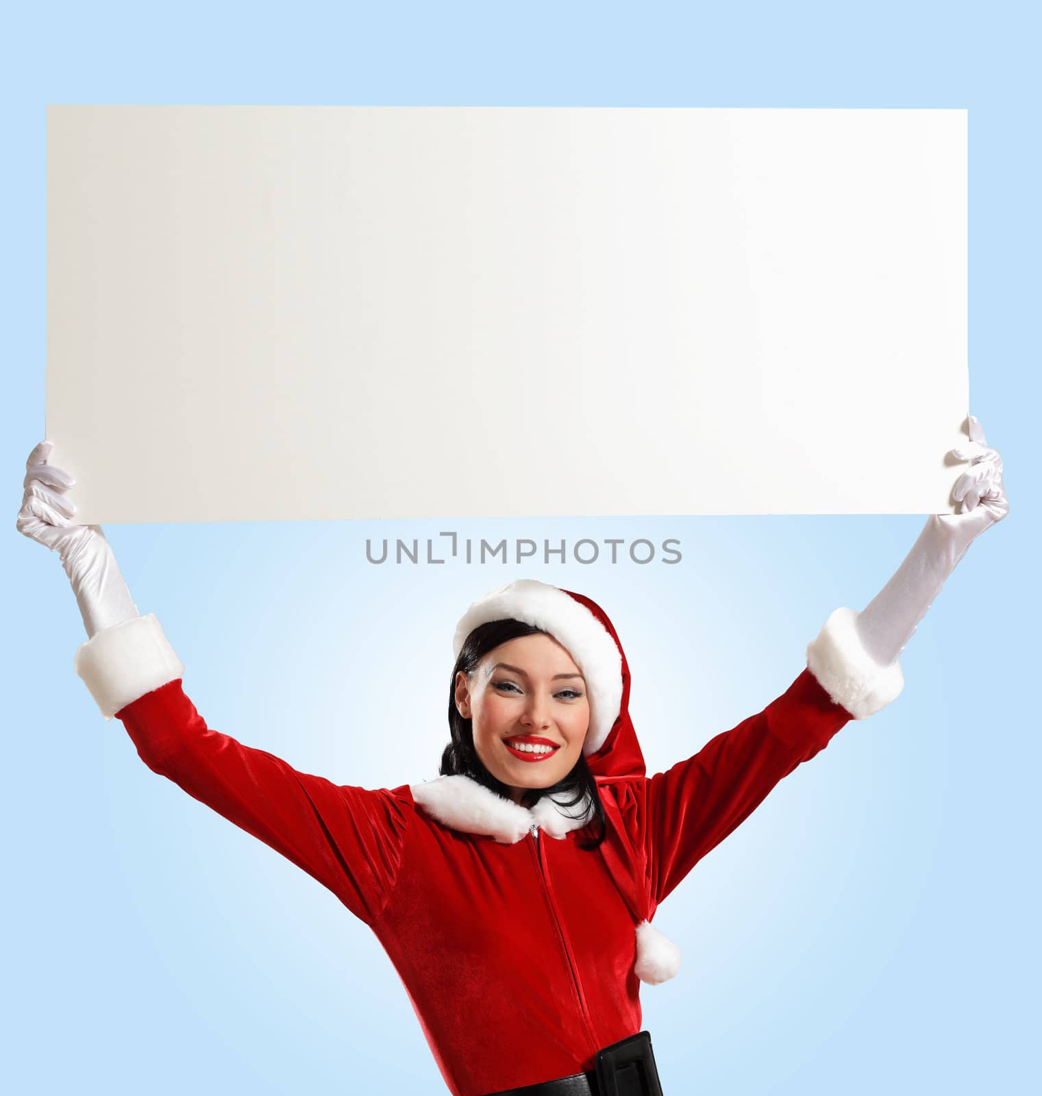 Portrait of a santa girl with a blank banner