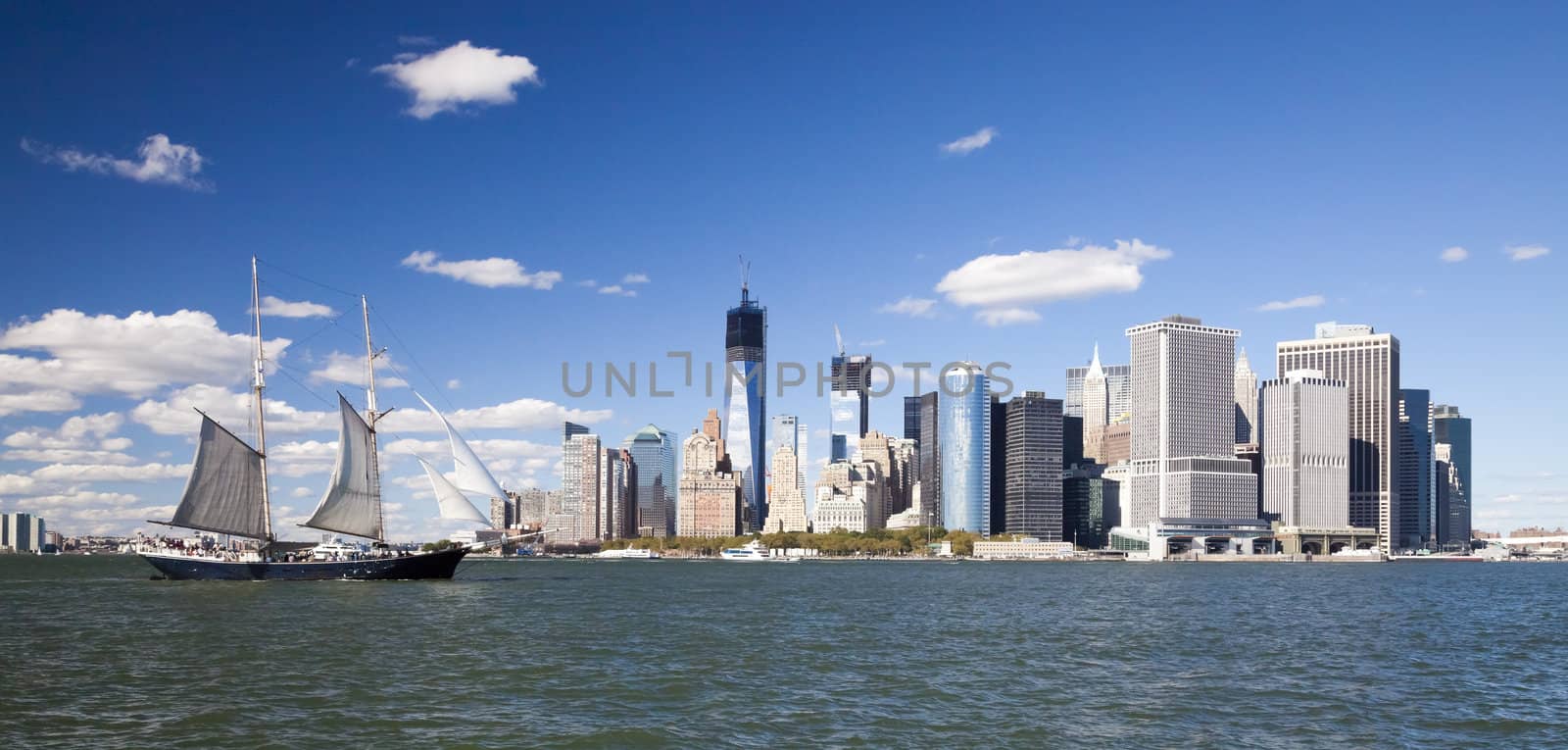 The New York City skyline at afternoon w the Tower 4 and Freedom tower under construction