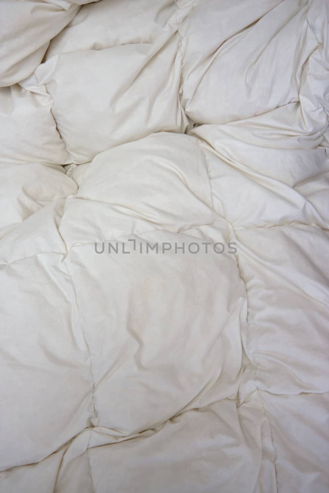 white bed linen in vertical